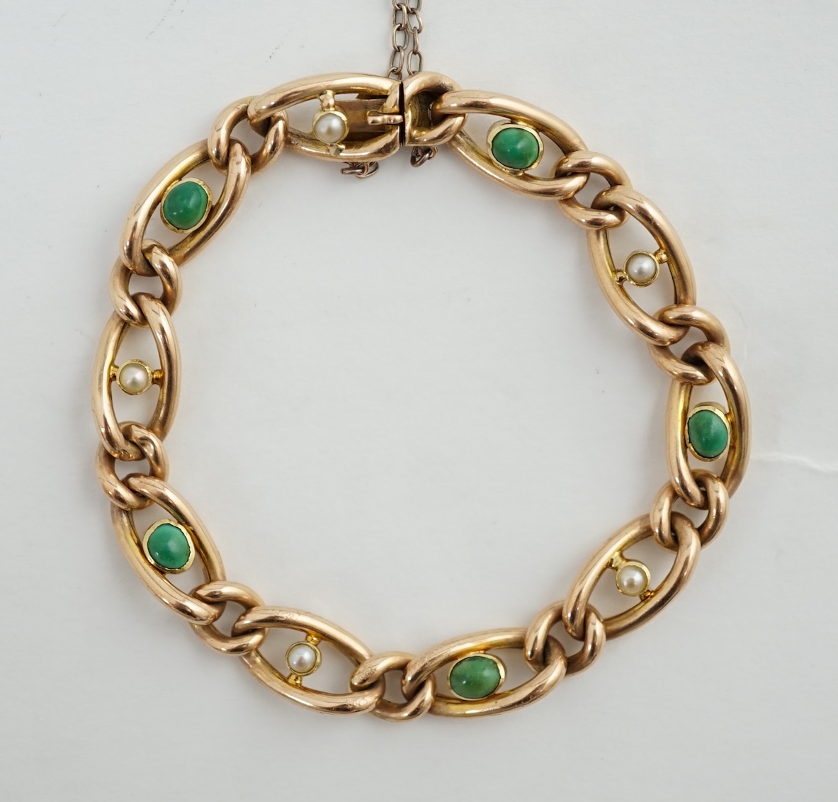 An early 20th century 15ct gold, turquoise and seed pearl set bracelet